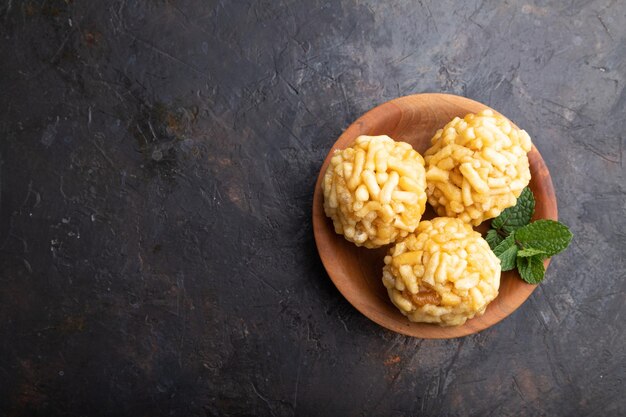 Traditional Tatar candy chakchak made of dough and honey on a black concrete background top view copy space