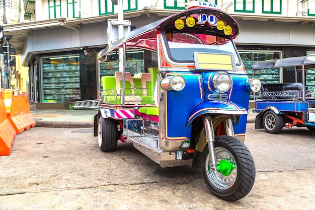 Traditional taxi tuk-tuk in Bangkok in Thailand