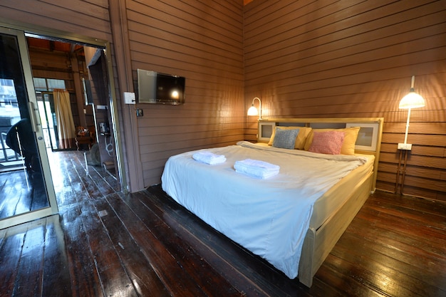 Traditional Thai style wooden bedroom