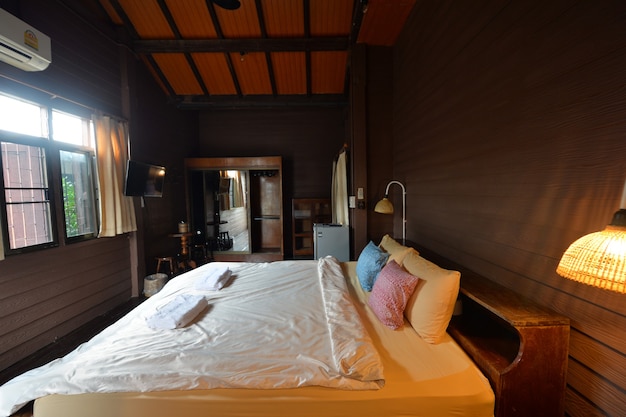 Traditional Thai style wooden bedroom