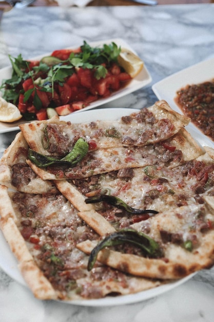 Traditional turkish baked dish pide Turkish pizza pide Middle eastern appetizers Turkish cuisine