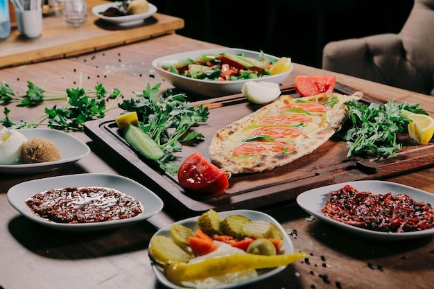 Traditional turkish baked dish pide. Turkish pizza pide, Middle eastern appetizers. Turkish cuisine.