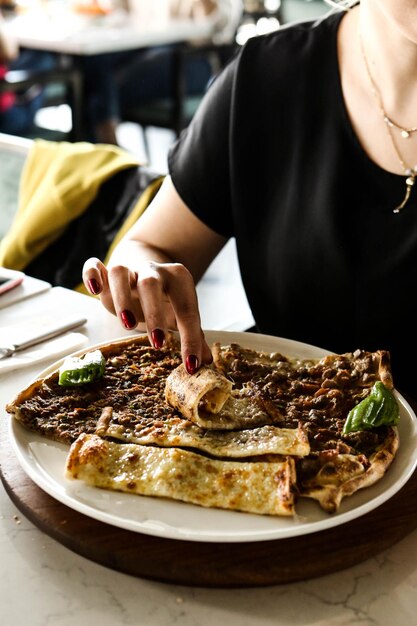 Traditional turkish baked dish pide. Turkish pizza pide, Middle eastern appetizers. Turkish cuisine.