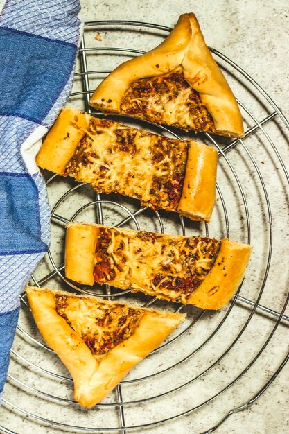 Traditional Turkish baked pide dish Turkish pizza Pide of cheese and meat