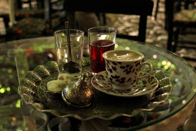 Traditional Turkish coffee brewed over charcoal