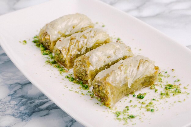 Traditional turkish dessert baklava with cashew walnuts Homemade baklava with nuts and honey