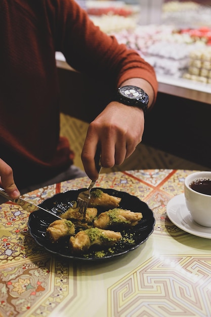 Traditional turkish dessert baklava with cashew, walnuts. Homemade baklava with nuts and honey.