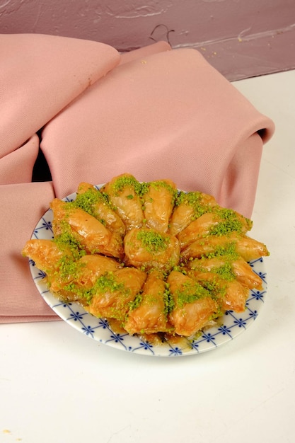 Traditional turkish dessert baklava with cashew walnuts Homemade baklava with nuts and honey