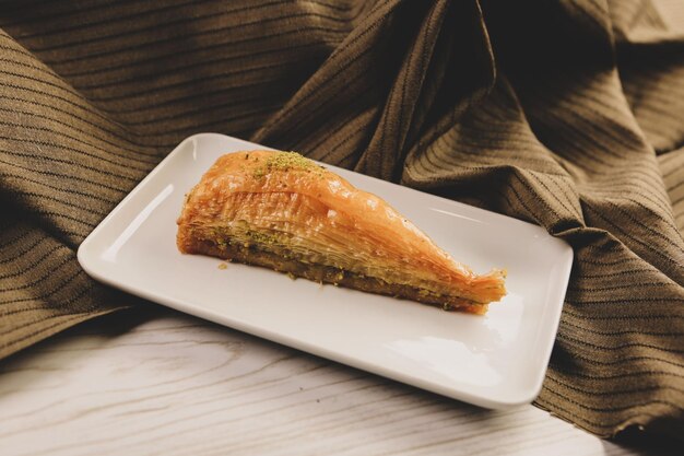 Traditional turkish dessert baklava with cashew, walnuts. Homemade baklava with nuts and honey.