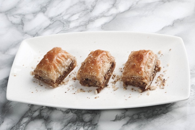 Traditional turkish dessert baklava with cashew, walnuts. Homemade baklava with nuts and honey.