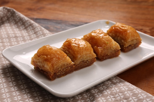 Traditional turkish dessert baklava with cashew, walnuts. Homemade baklava with nuts and honey.