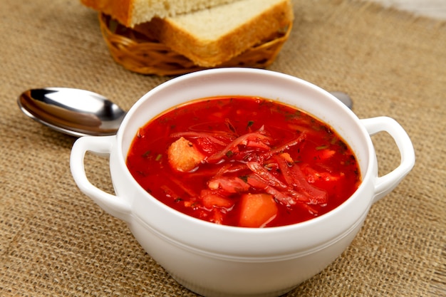 Traditional Ukrainian borsch with meat, garlic and parsley