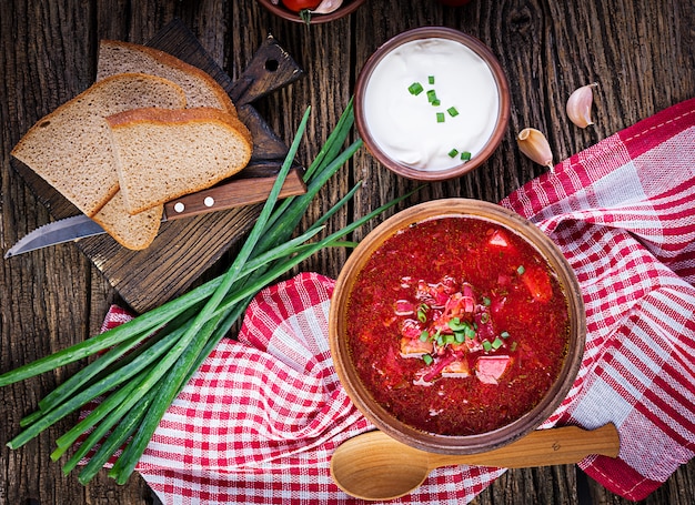 Traditional Ukrainian Russian borscht or red soup in the  bowl. Top view