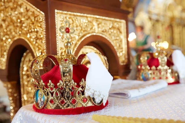 Traditional wedding crowns in a church Wedding crown in church ready for marriage ceremony