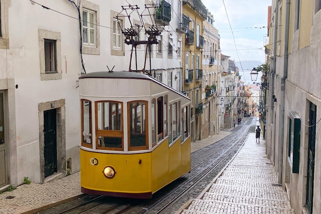 Traditional yellow tram in Lisbon Portugal