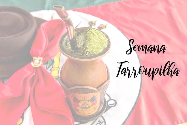 Traditional yerba mate tea chimarrao gaucho from southern Brazil Rio Grando do Sul flag in the background