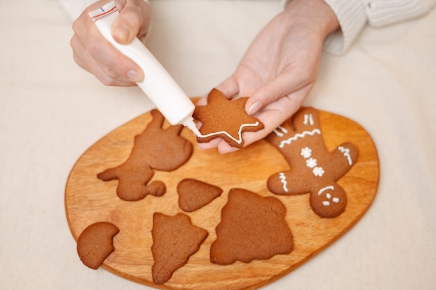 Traditions for celebrating christmas and new years making gingerbread sweets baking decorations