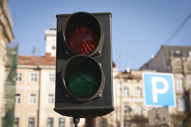 Traffic light in autumn day selective focus