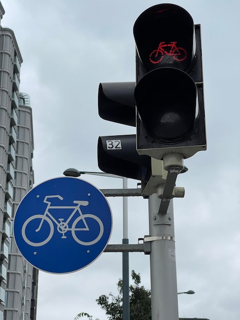 Traffic lights for cyclists glowing red prohibiting cycling