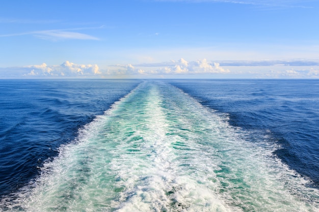 Trail on water surface behind the ferry