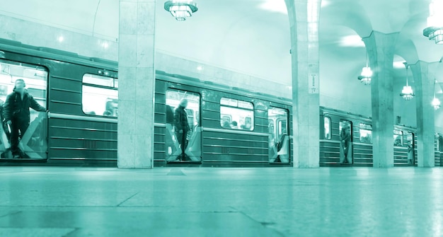 A train station with a green background and a blue background.