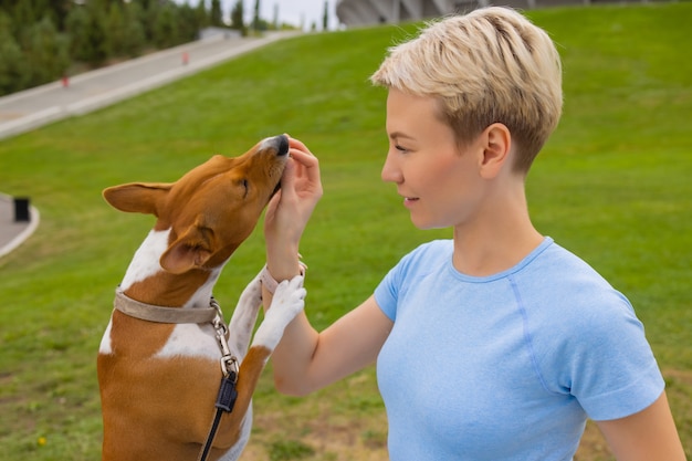 Trained intelligent dog taking food from human