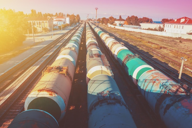 Trains of tanks on the railway station in the evening