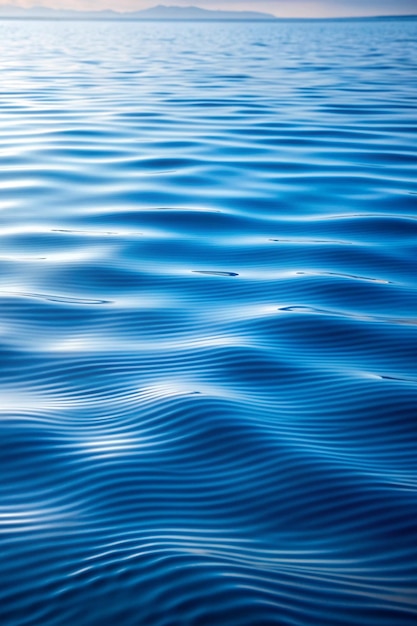 Photo tranquil water surface texture a serene closeup view of light blue water with gentle ripples