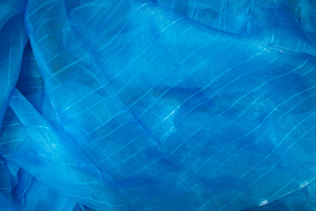 Translucent blue net fabric can be used as a background wallpaper