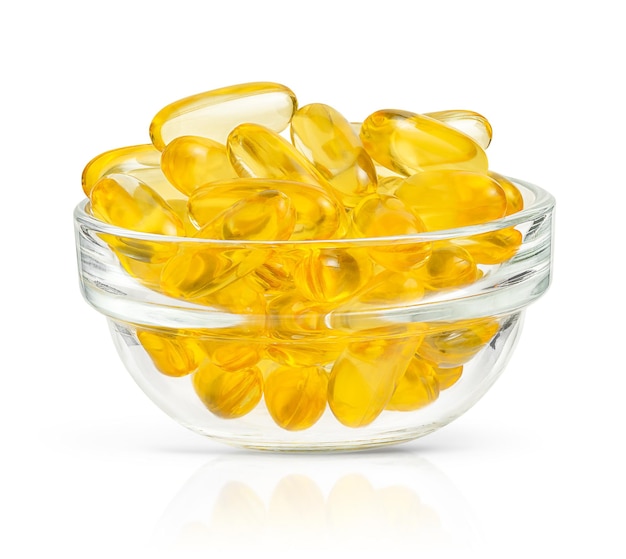 Transparent bowl of omega  soft gel capsules isolated with clipping path