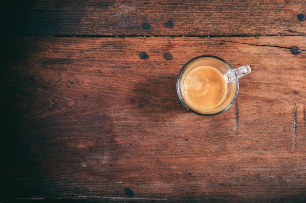 Transparent cup of espresso