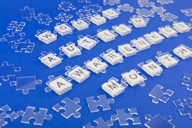 Transparent jigsaw puzzle details on inscription on blue background