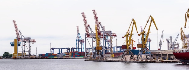 Transportation and shipping logistics loading dock terminal., container import and Export of sea freight transport industrial. Marine port with cranes.