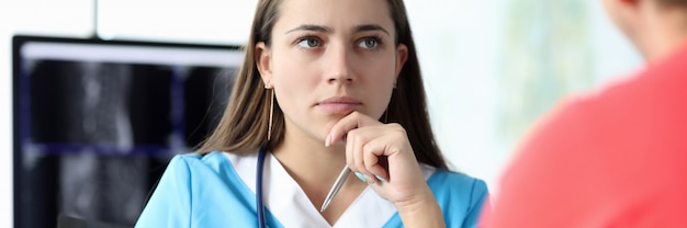 Traumatologist holding x-ray