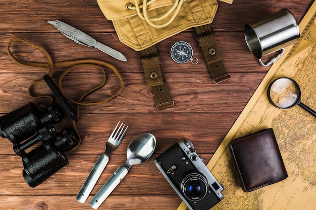 Photo travel accessories and eating utensil on table