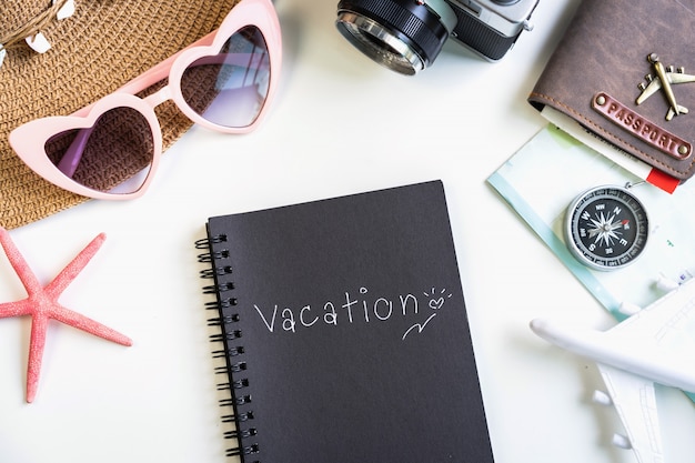 Travel accessories and items with vacation note and copy space, Travel concept