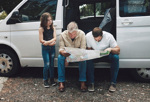 Travel car and family with map for direction transportation support and planning course journey on Canada road trip Kid girl grandpa dad on auto SUV van vacation and lost driver search for way