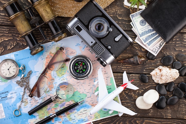 Travel items and accessories on the table.