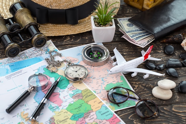 Travel items and accessories on the table.