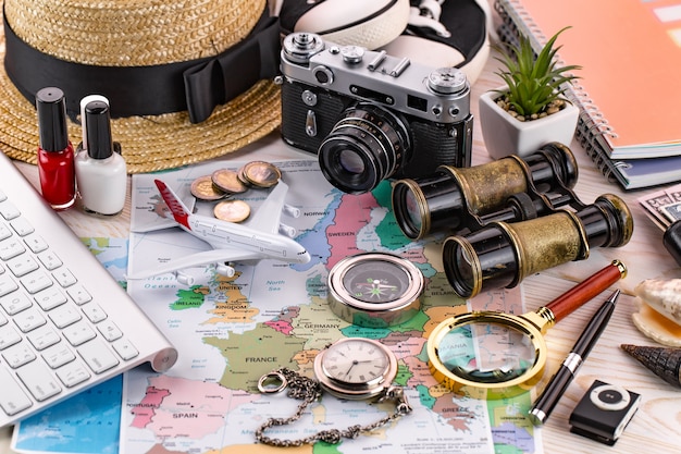 Travel items and accessories on the table.