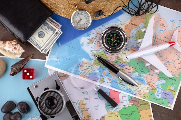 Travel items and accessories on the table.