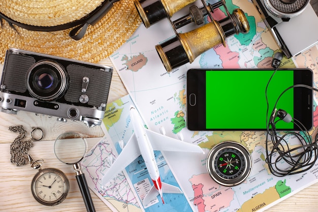 Travel items and accessories on the table.