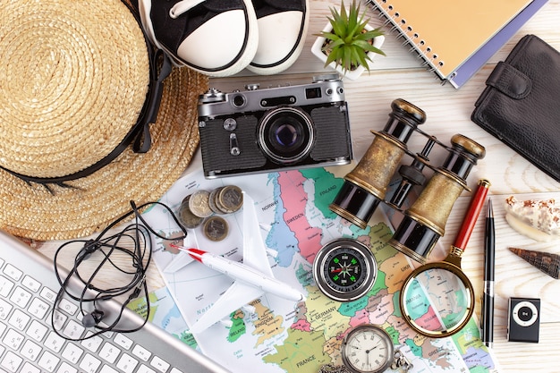 Travel items and accessories on the table.