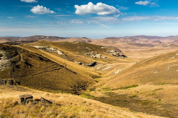 Travel to Lesotho Landscape of mountains and grassy hills in Sehlabathebe National Park