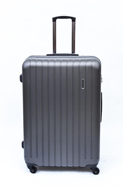 Travel luggage isolated on the white background