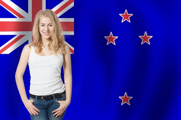 Travel in New Zealand Happy girl student with New Zealand flag