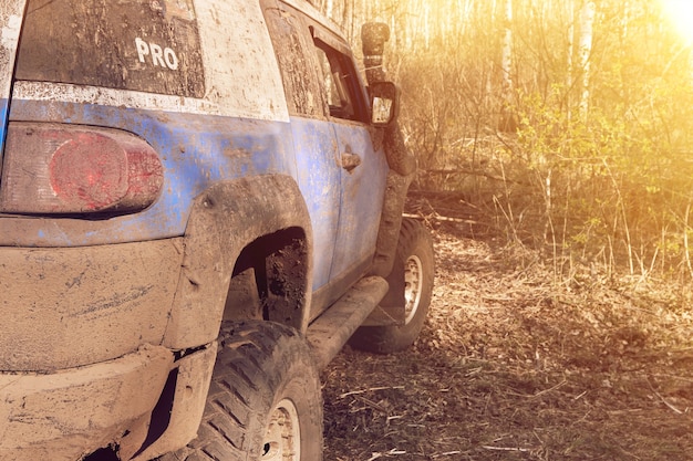 Travel off-road on a mountain road in a 4x4 car. Beautiful nature sunset