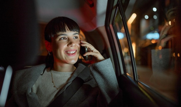 Travel phone call and business woman in car chatting talking or speaking to contact Transport night and happy female professional with mobile smartphone for networking discussion or conversation