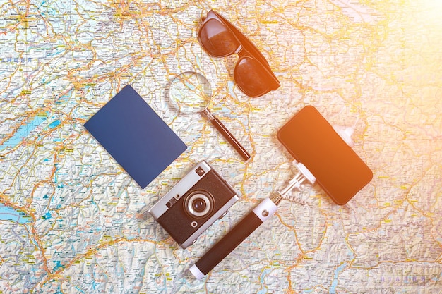 Travel plan trip vacation accessories for trip tourism mockup outfit of traveler on map background