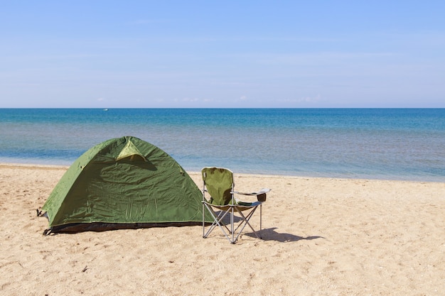 Travel to the sea tent and camping chair on the beach